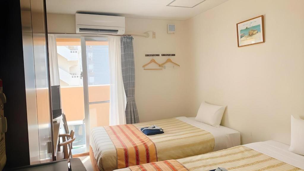 Hotel Peace Land Kume Naha Kültér fotó