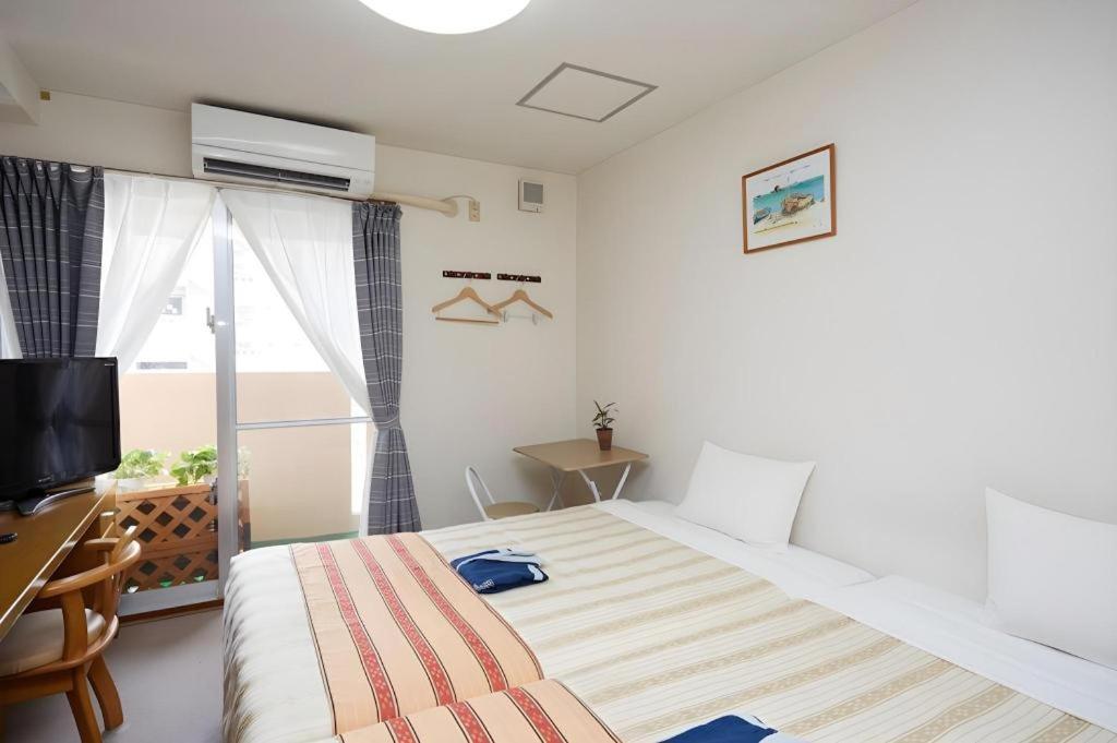 Hotel Peace Land Kume Naha Kültér fotó