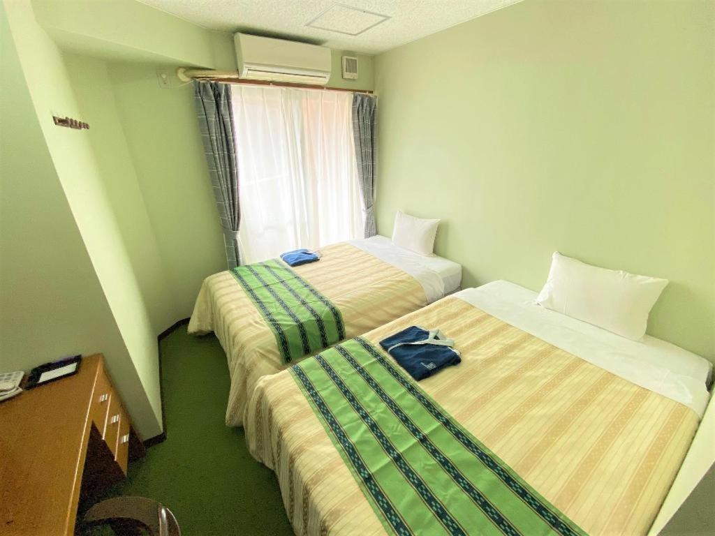 Hotel Peace Land Kume Naha Kültér fotó